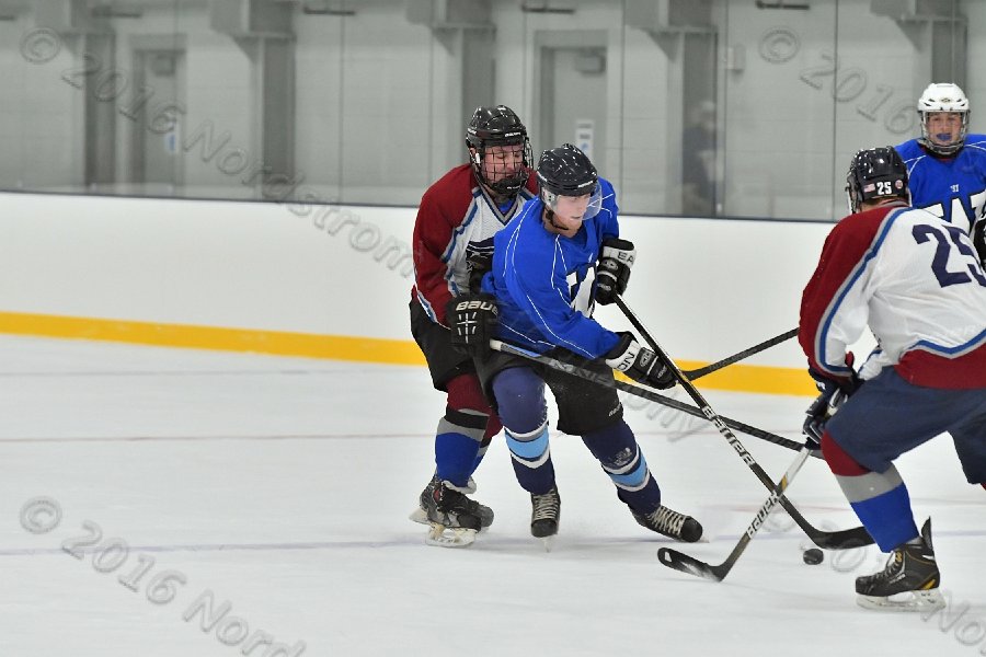 Wheaton College Men\'s Ice Hockey vs Middlesex Community College. - Photo By: KEITH NORDSTROM